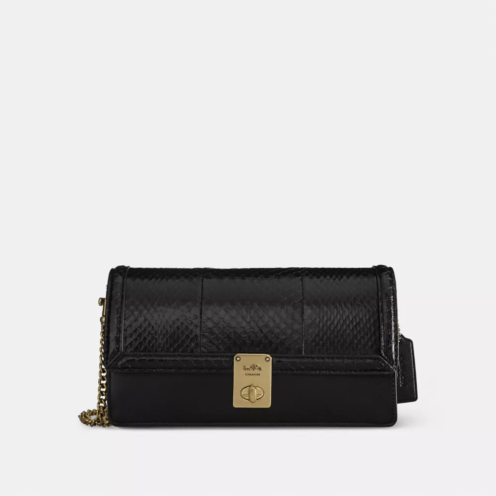 Coach Hutton rounded clutch bag pebbled leather black detachable chain strap evening elegant