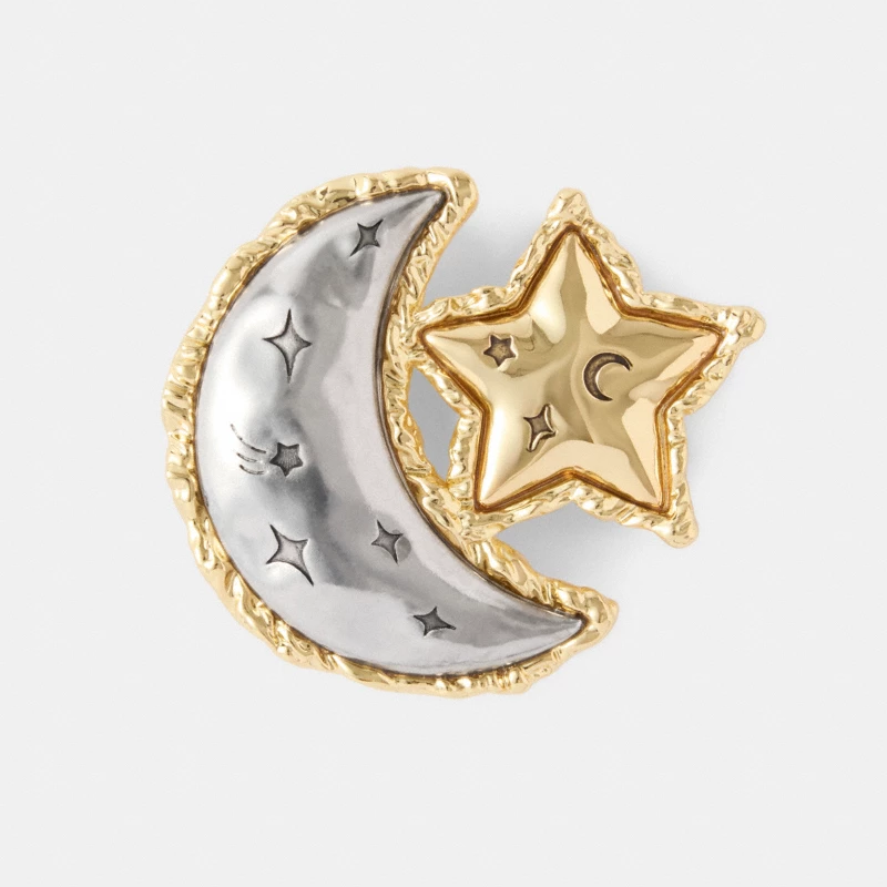 Coach Sun Brooch gold celestial hand-hewn Fall 2026 runway detail