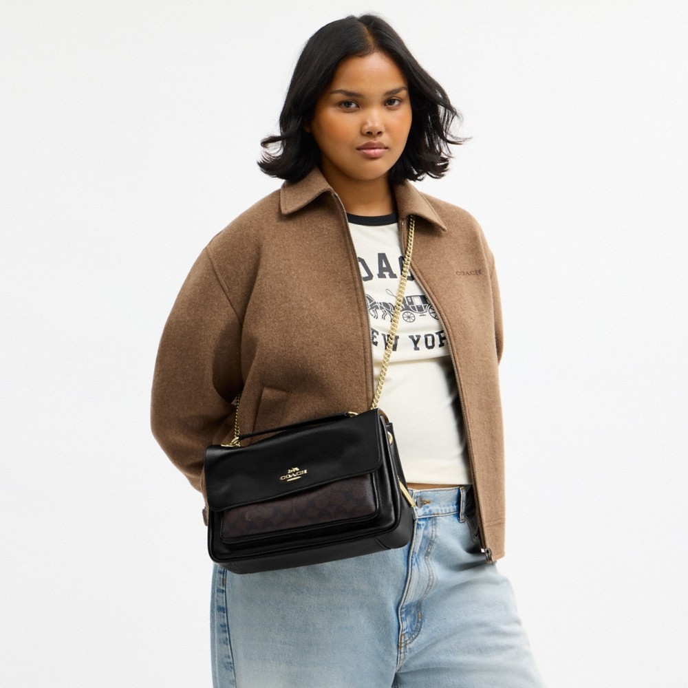 Coach Outlet Elodie Crossbody Bag In Signature Canvas - Preorder
