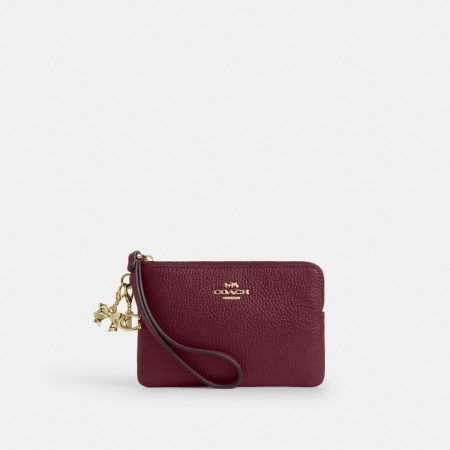 Coach Outlet Boxed Corner Zip Wristlet With Charms - Preorder — Brass/Dark Cherry